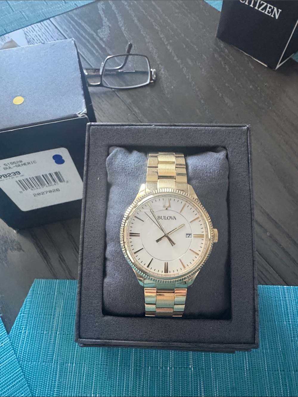 Bulova Gold Tone Watch with White Dial and Date